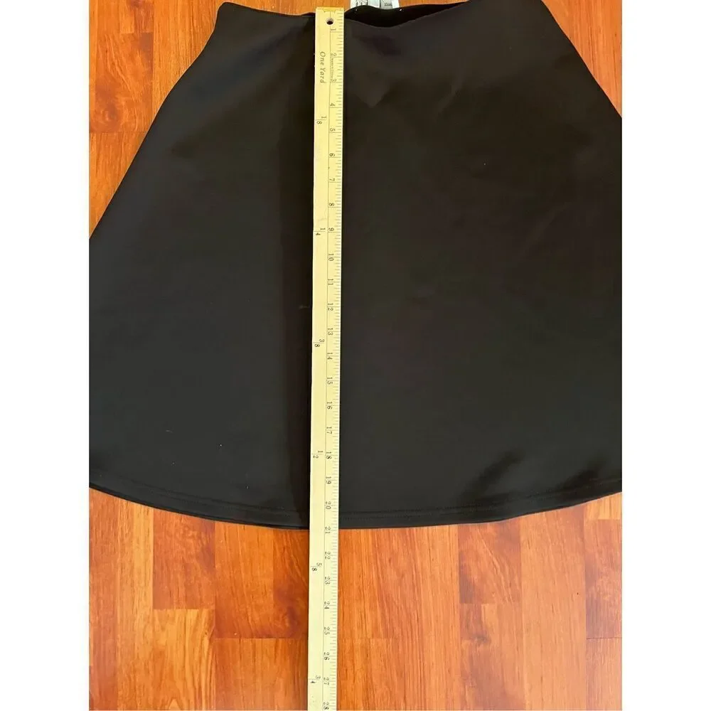 Spense black a-line slip on skirt size medium petite.